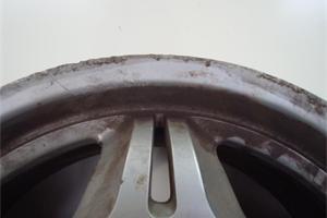 Kerbed Bmw wheel before refurbishment