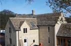 A Converted Cottage and Extensions, roof in Cotswold Stone Tiles