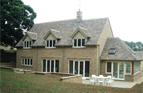 New Dwelling Roofed in Bradstone Weathered Buff Tiles