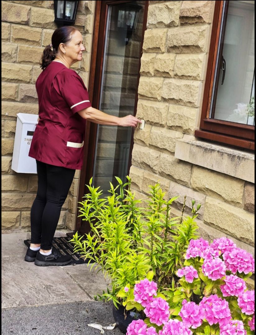 Carer ringing the doorbell