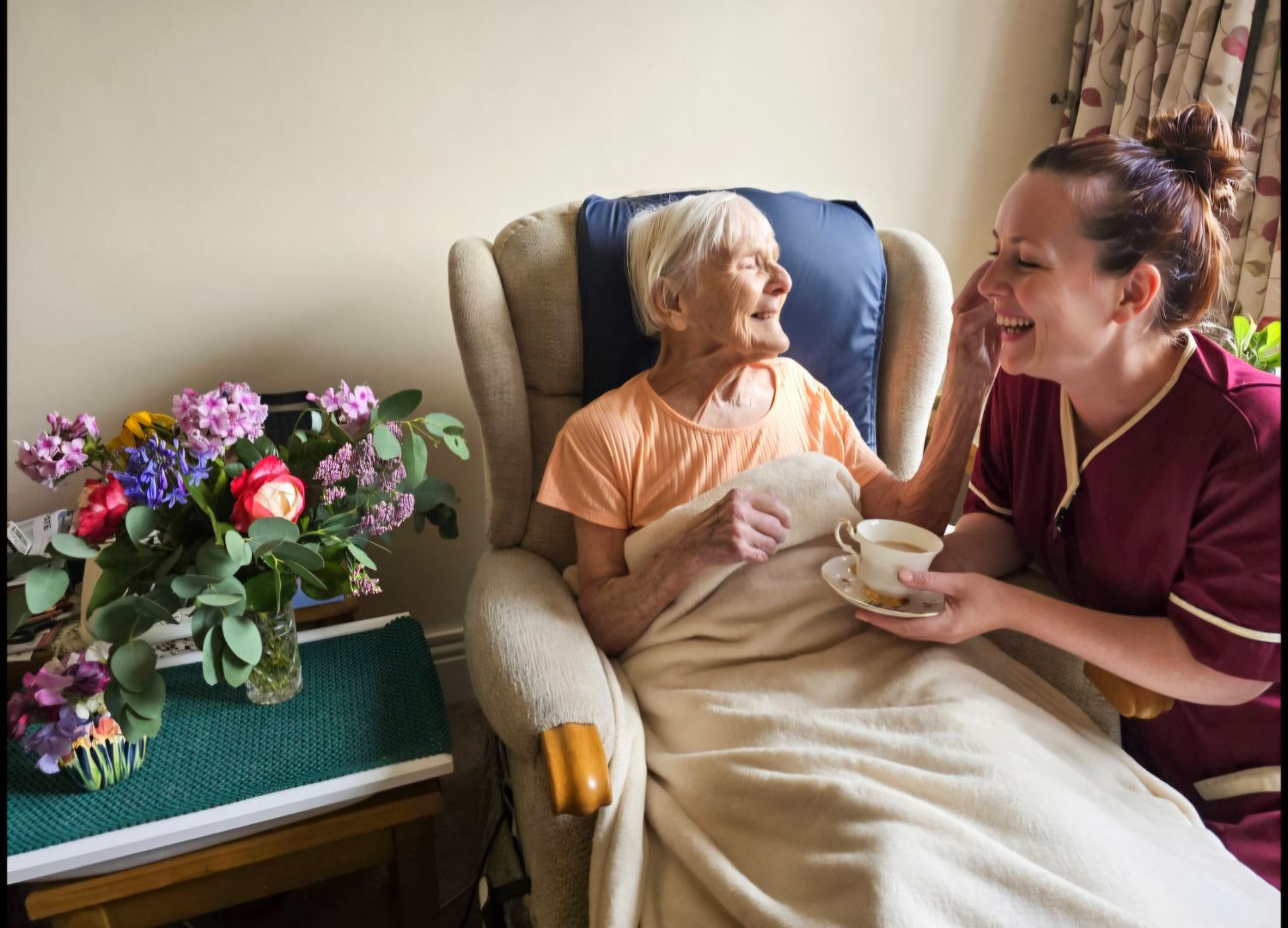 Carer with cup of tea