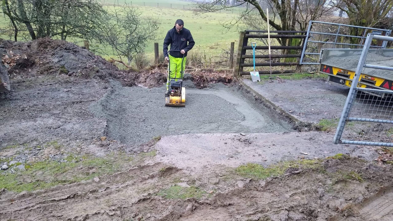 Hardcore being laid in pit for Hopkins cattle grid