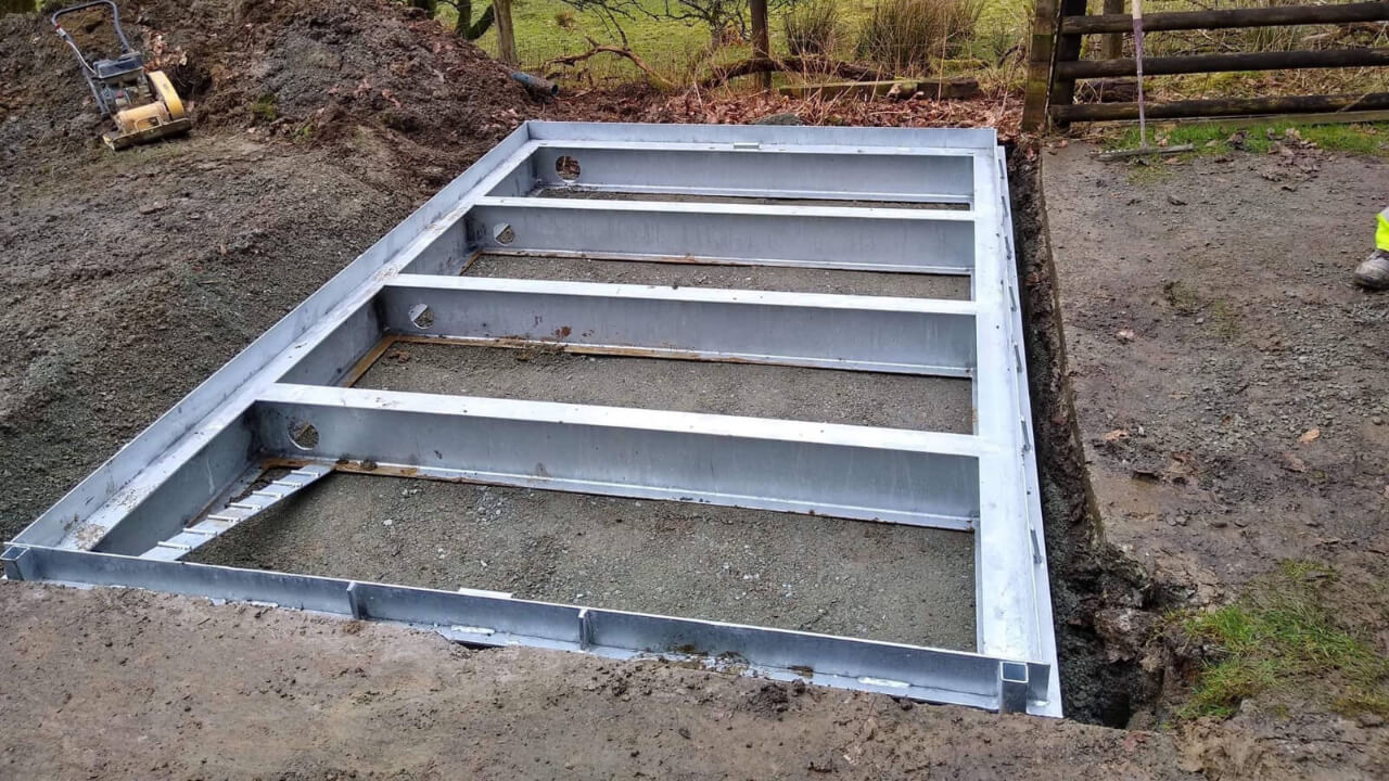 Hopkins cattle grid being installed in pit