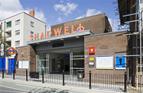 Shadwell Station for London Overground, Building refurbishes with replacement roof to Cable Street entrance. Opened May 2010