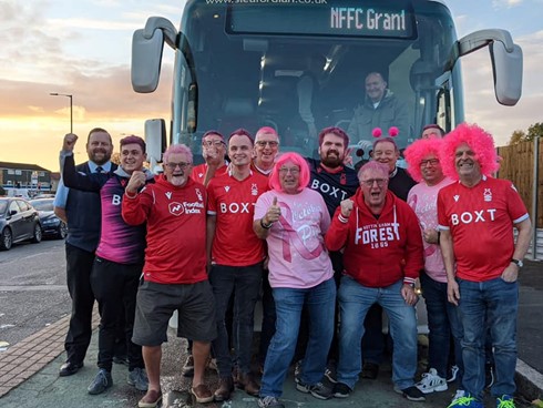 Members of the Grantham  branch on their way to QPR  raising funds for Pink October  in 2021.