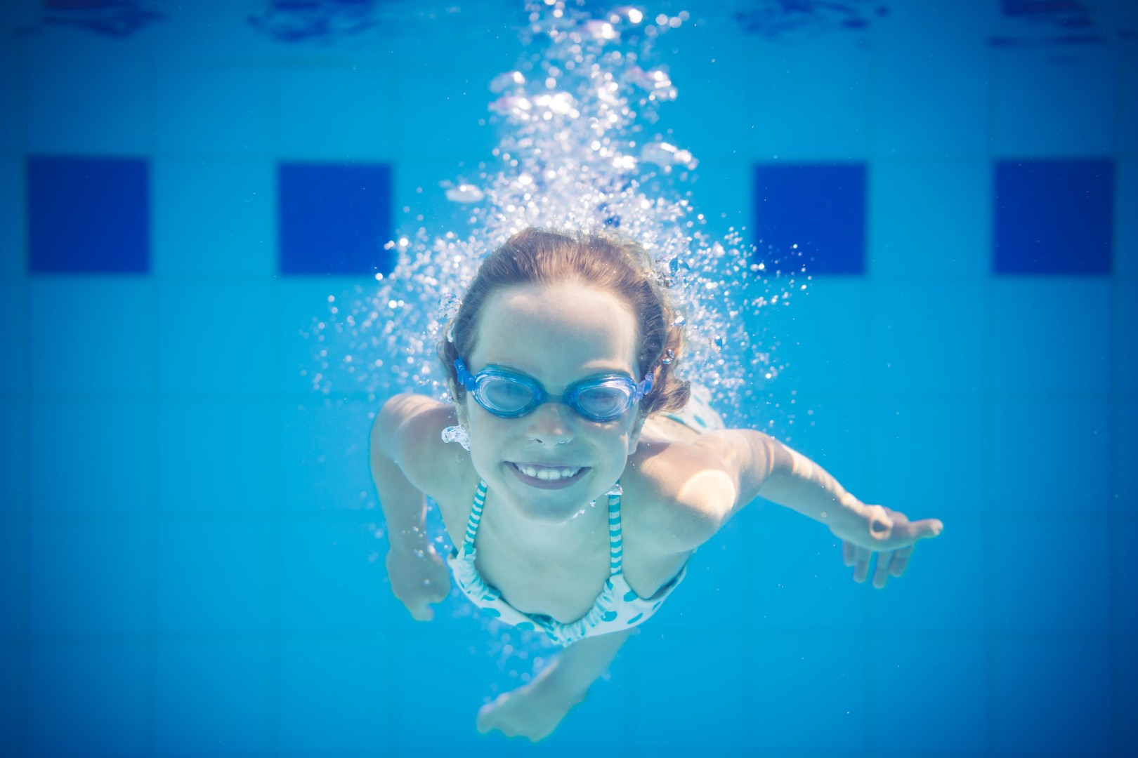Underwater portrait of child