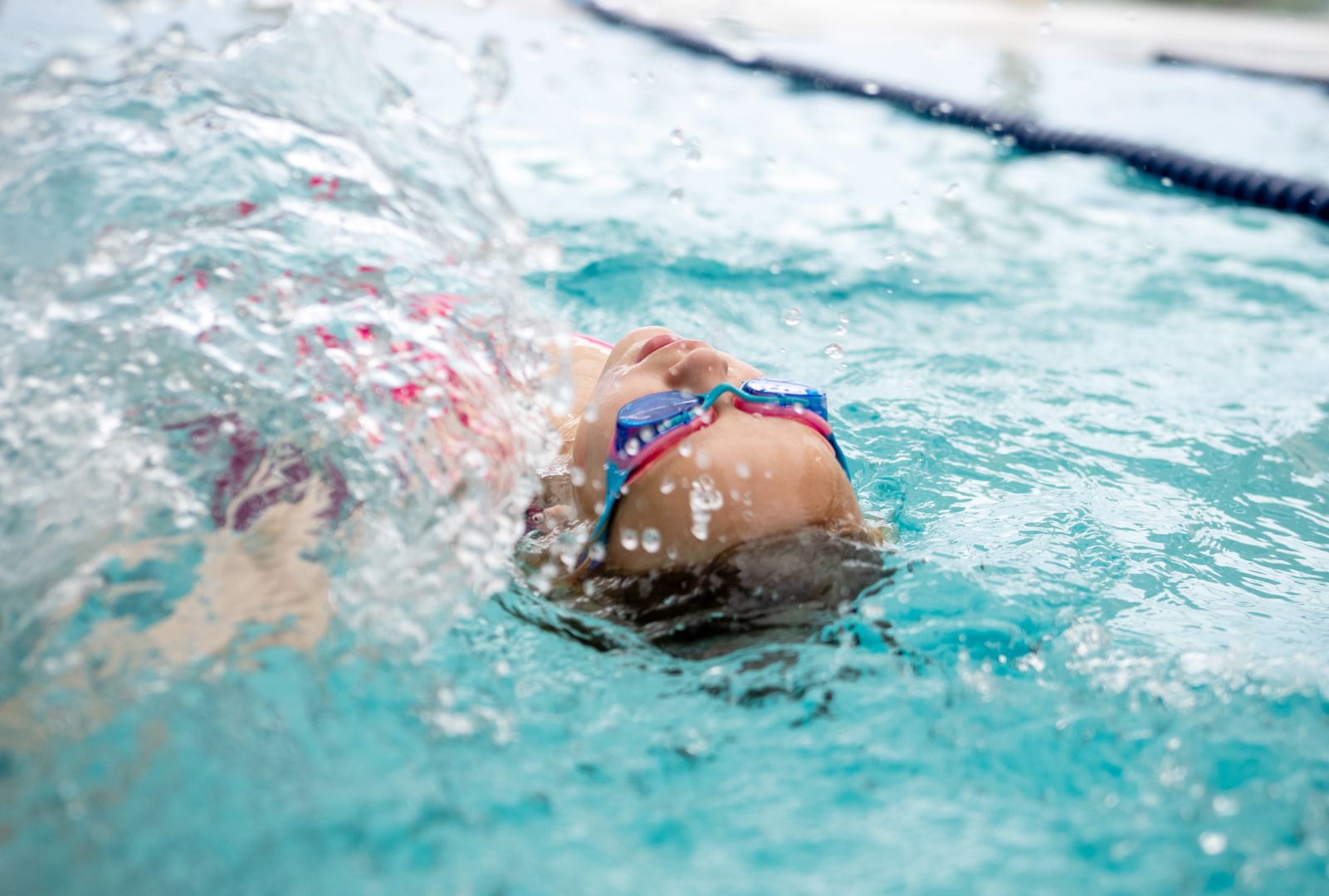 Young swimmer wearing goggles