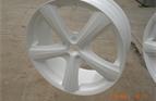 Alloy wheel after blasting and primed ready for finish coat