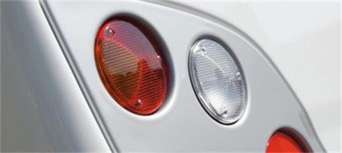 Indicator and Brake Light Surround, formed in a metalic silver - UV stable and durable!