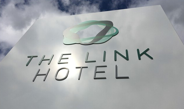 The link hotel sign