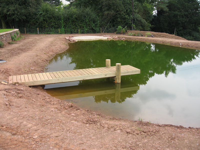 Large jetty on large pond in Somerset