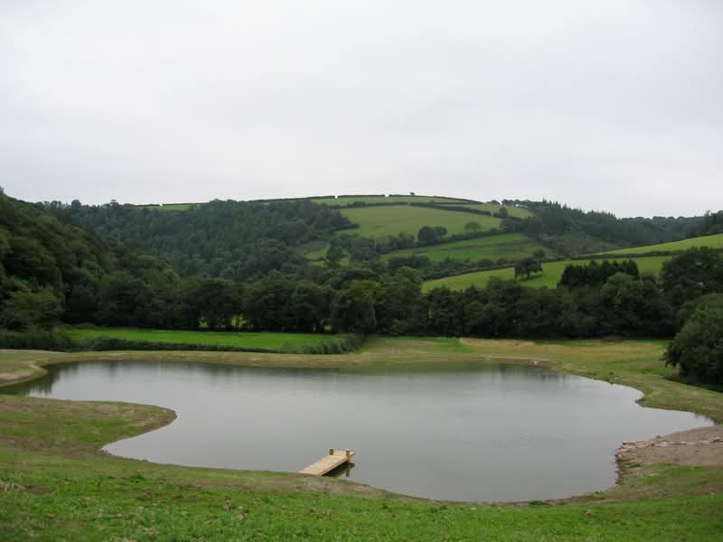 Three quarter acre lake with liner fitted and jetty