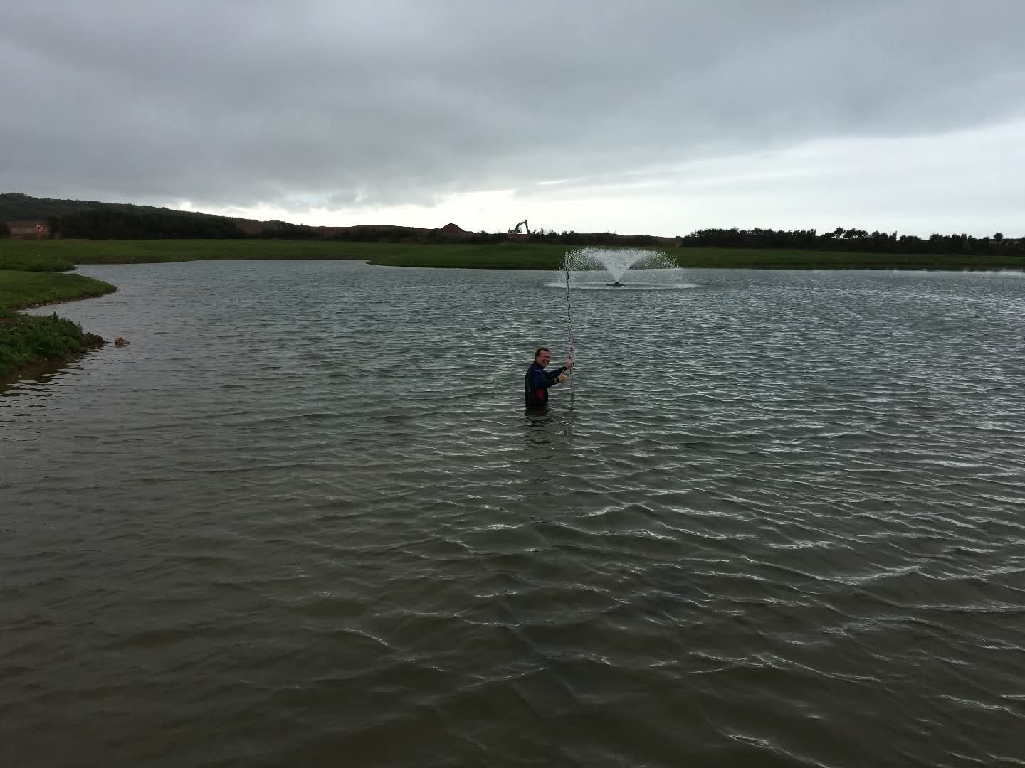 Fountain aerator on large lake with HDPE liner fitted