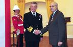 Capt James Ferro MBE receiving the Merchant Navy Medal from the Governor of Gibraltar