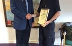 Robert Walker receiving a Certficate of Commendation from Bob Jones, Chairman, MNWB upon his retirement from the Border Force and North & East Scotland PWC, Sept'14.