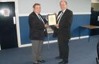 Peter White receiving a Certificate of Commendation from David Parsons, Chief Executive, MNWB upon his retirement as Chairman of the London & SE PWC, Sept'13