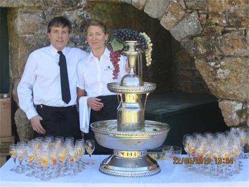 Staff serving the Pimms at St Ouens Manor