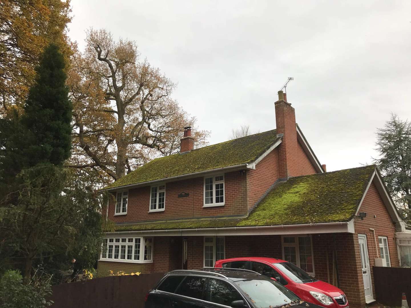 House with dirty roofs before