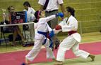 Hannah in action at a competition (blue gloves)