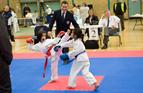 Antonia in action at a competition with high kicks