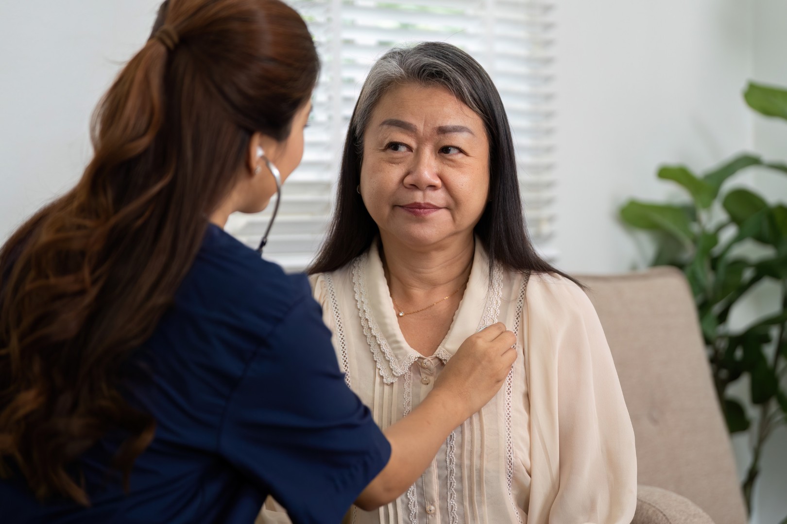 Young nurse elderly patient