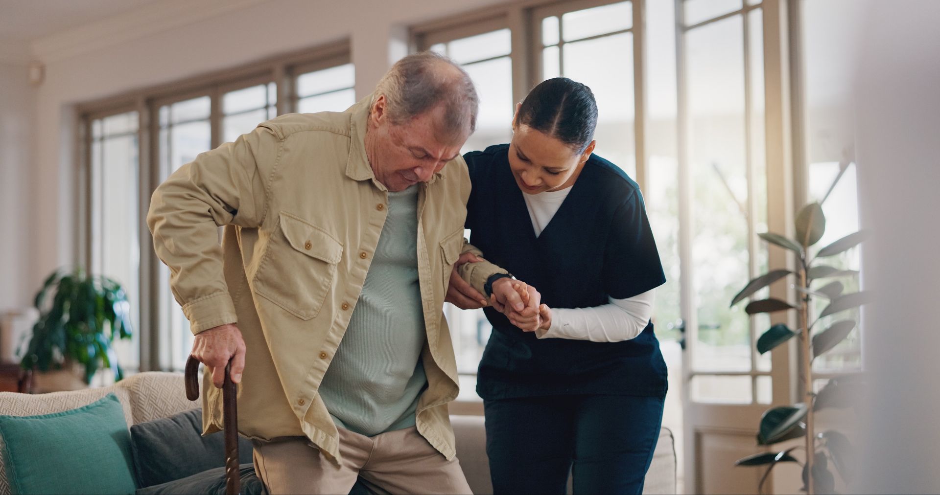 Nurse helping man