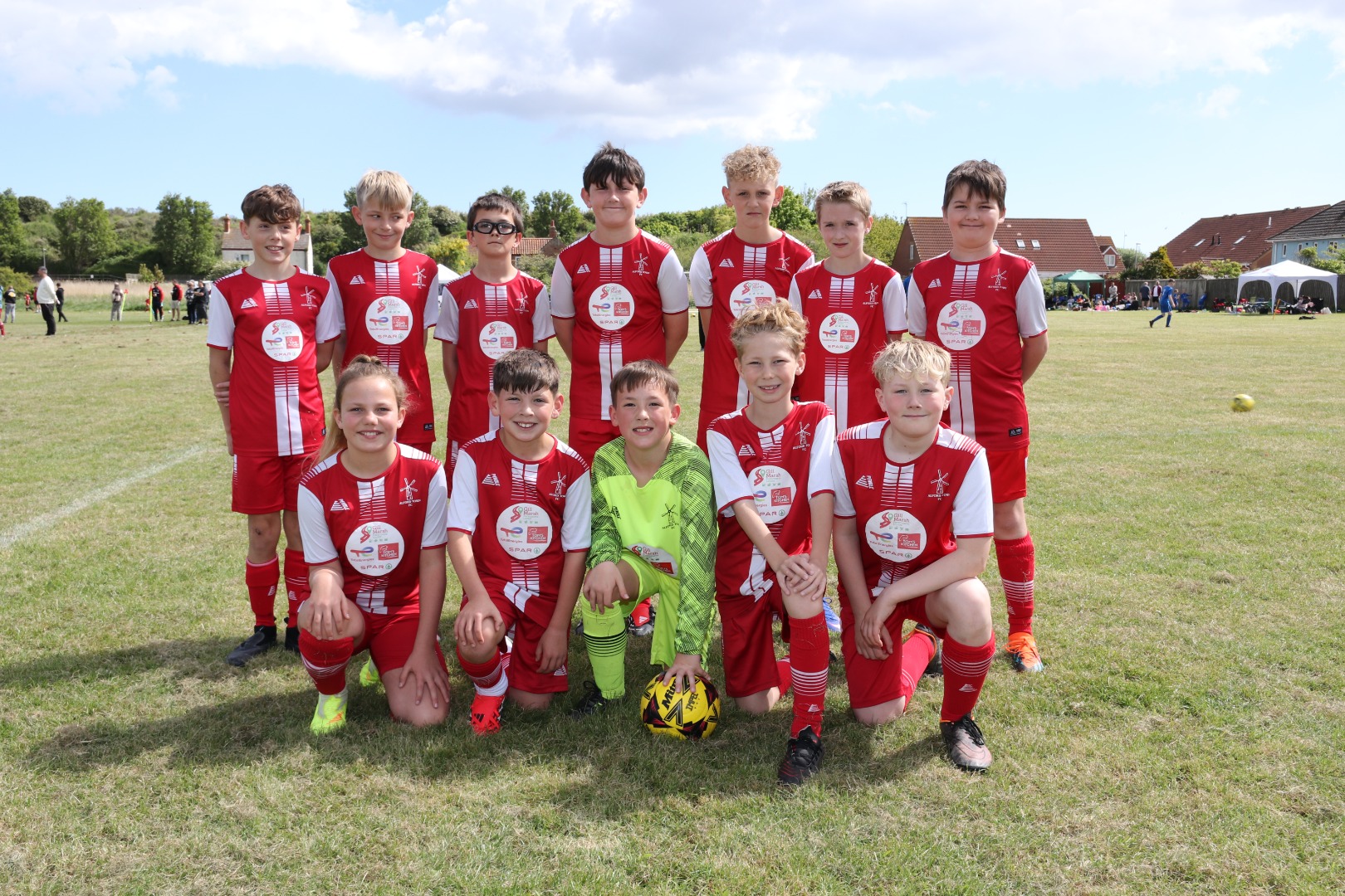 team posing for picture