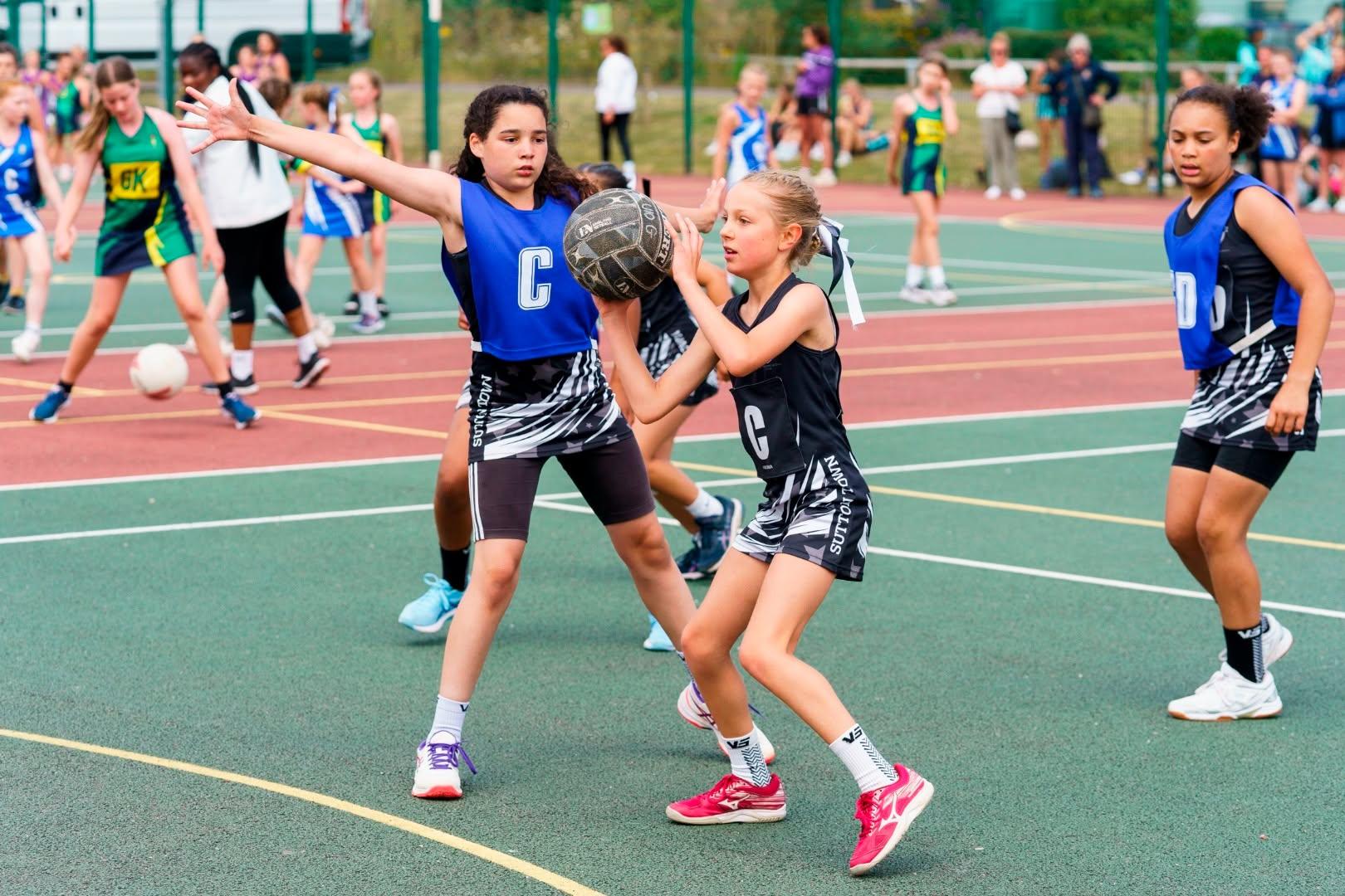 Girls playing netball