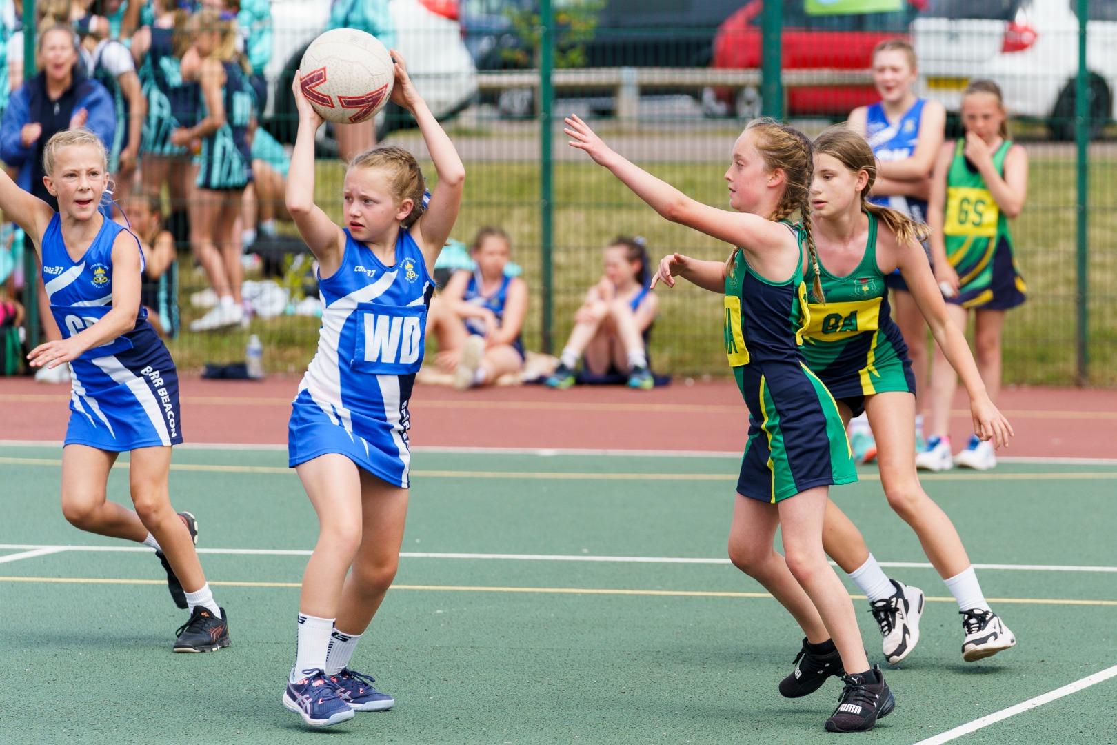 Girls playing netball