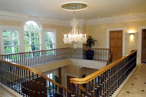 Oak hand rail - wrought iron spindles 