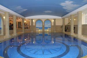 Pool with stone columns, Tromp. detail set into arches