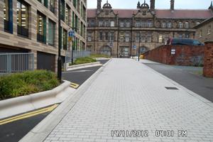 Complete Full external work package to adoptable standards for newly built civic offices. Shaping up, ducts & drainage (above and below ground), kerbing, reforming roads, block paving laid with supported sub bed and decorative banding.