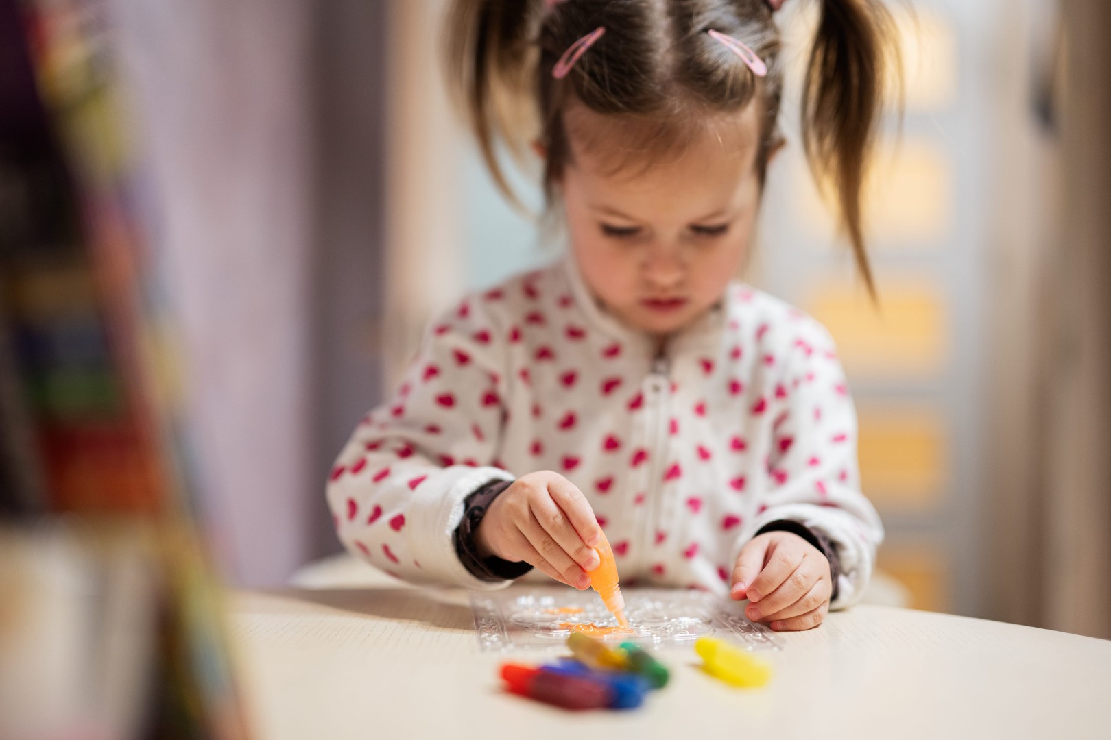 Baby girl with pigtails decorating art