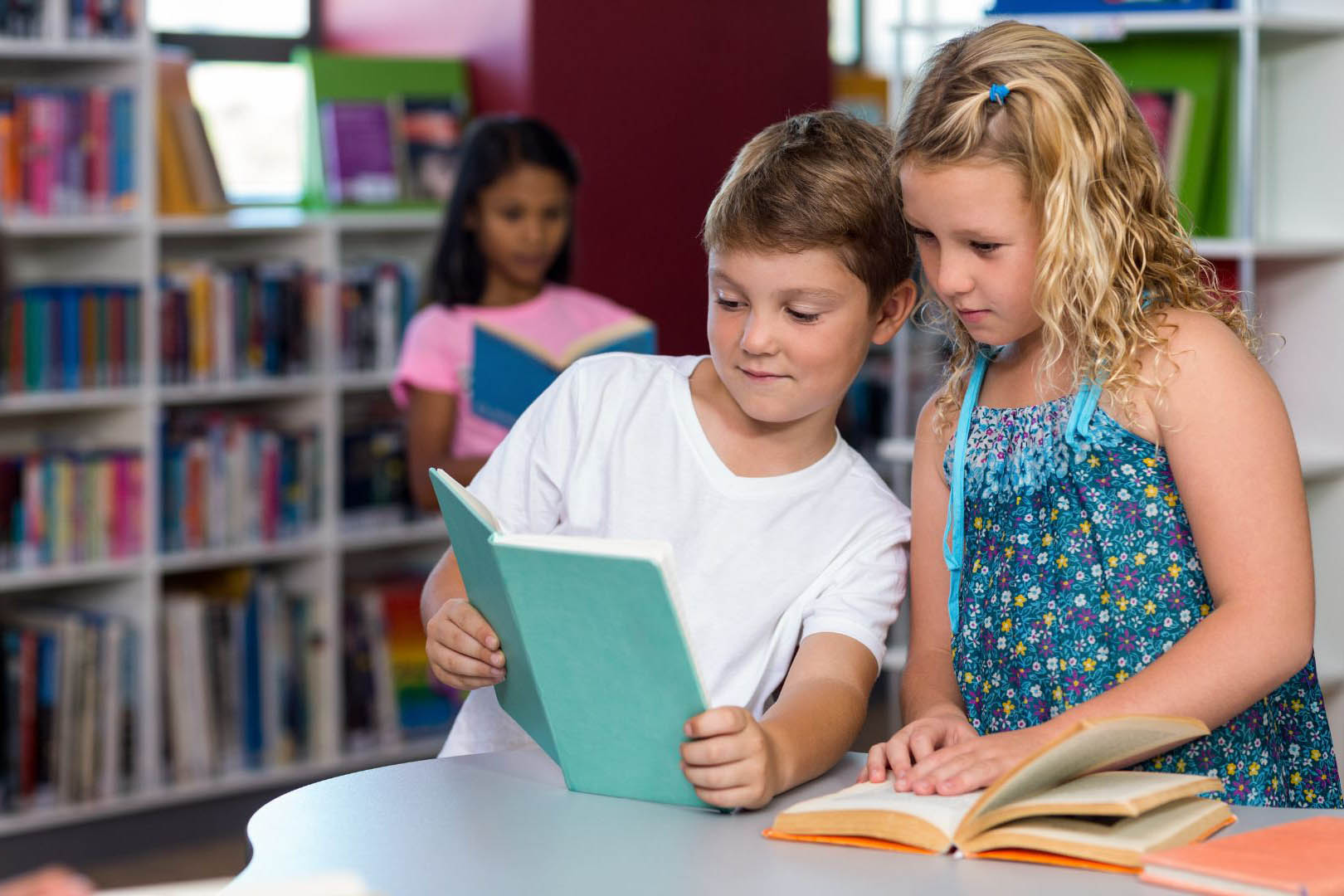 Boy showing book