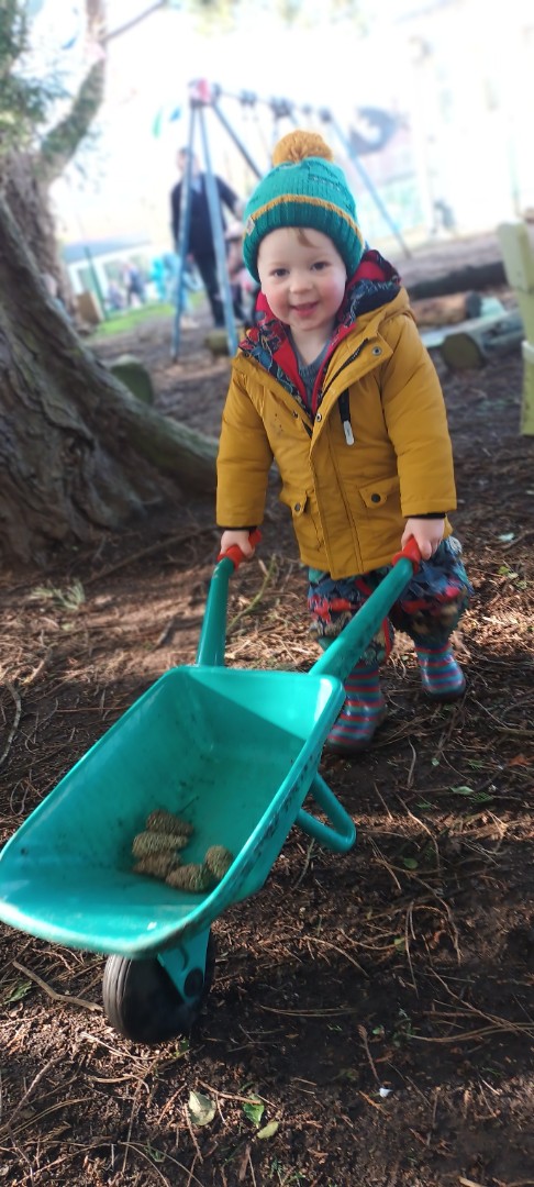 Little boy playing in the garden
