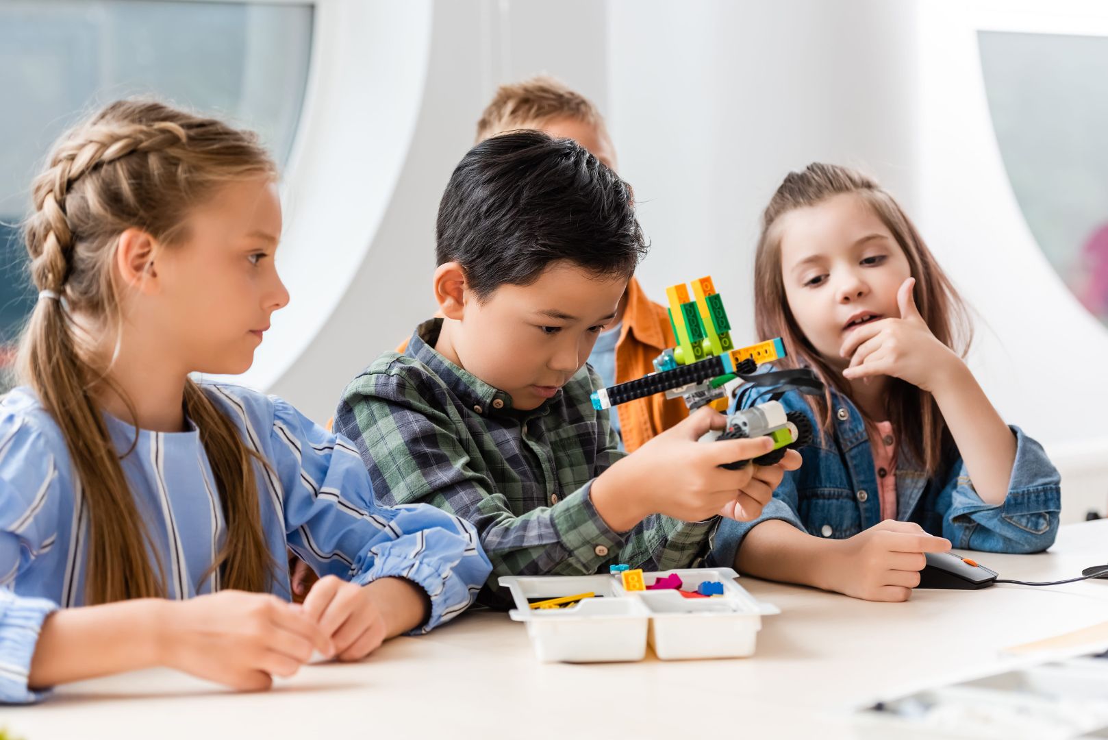 Schoolkids modeling robot