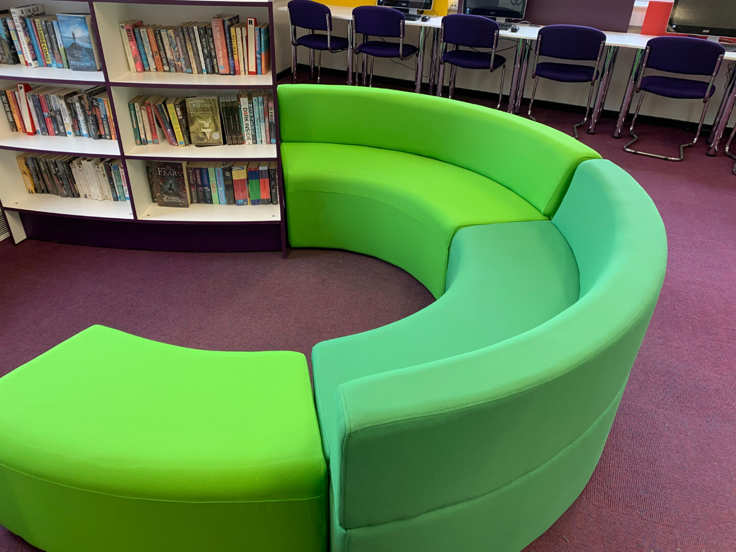 green curved chair