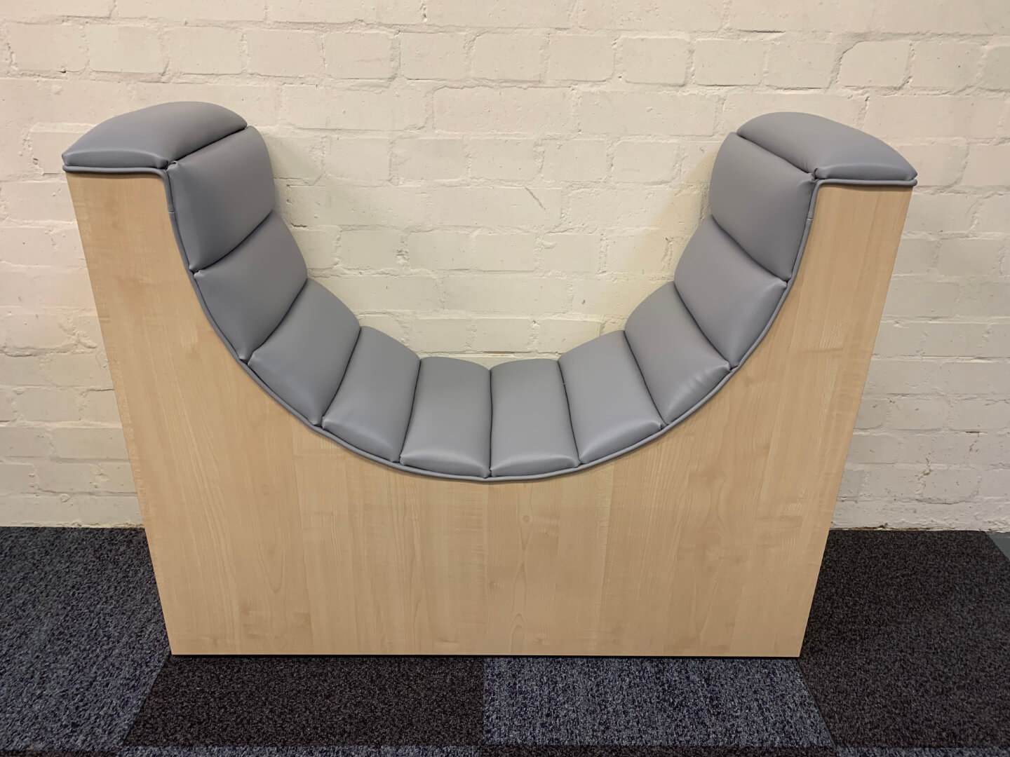 grey curved seat