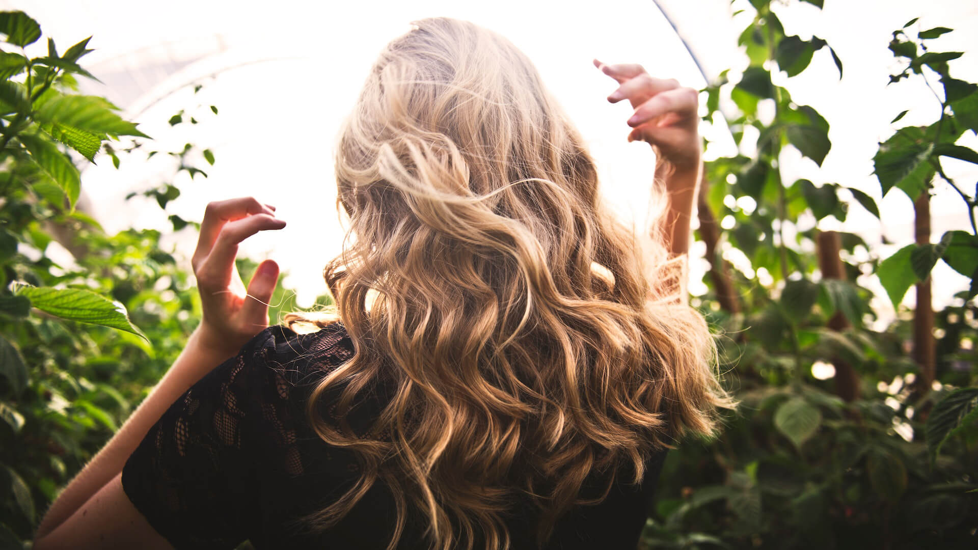 woman with blonde curly hair