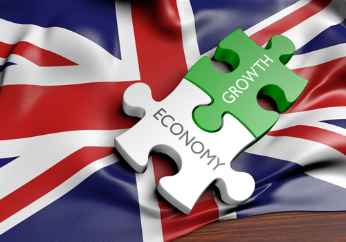 Economy and Growth jigsaw pieces over Union flag - small business productivity in the UK