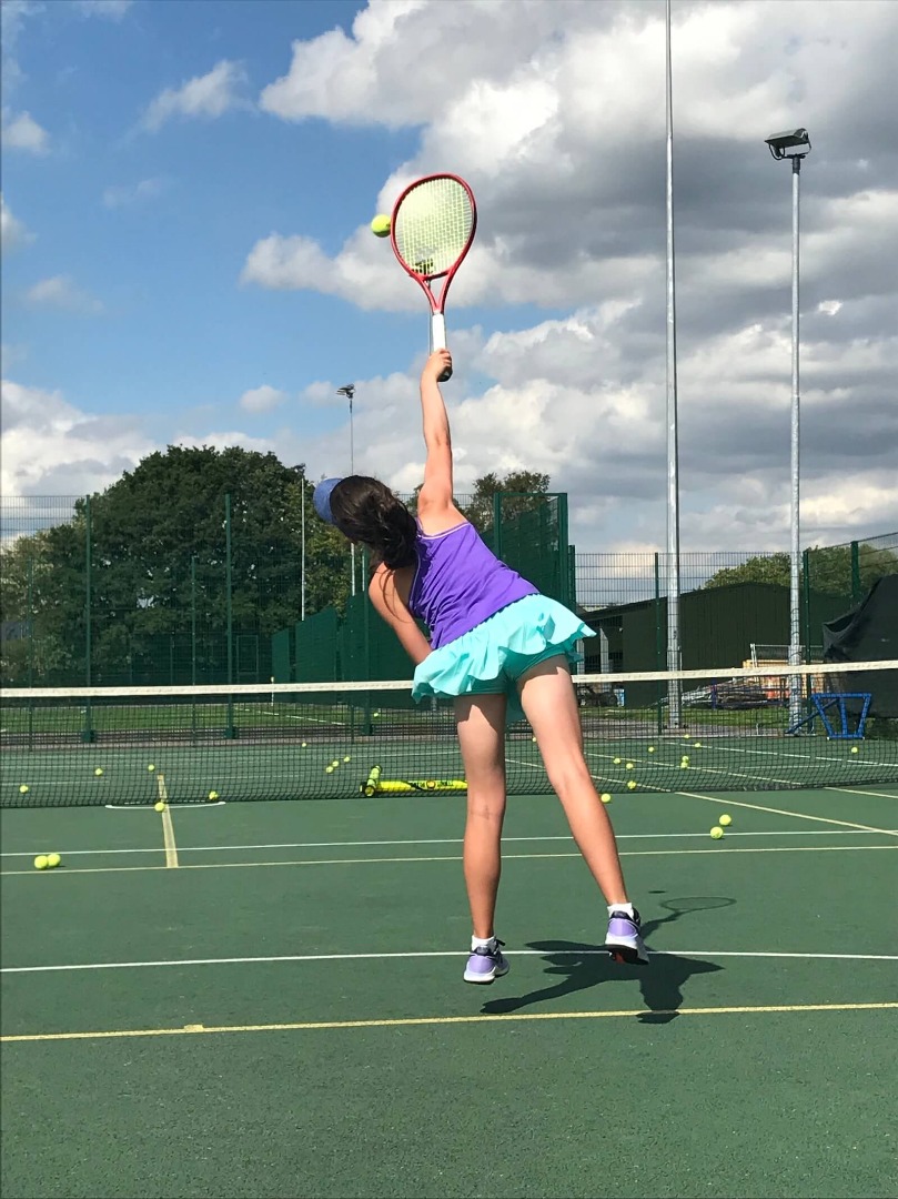 Female Junior Tennis Player Serving | Serve Shot | Mid-Serve