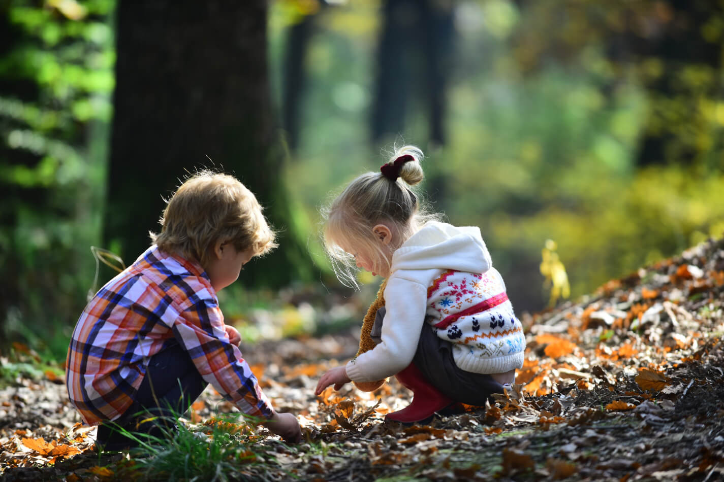 Children playing in autumn