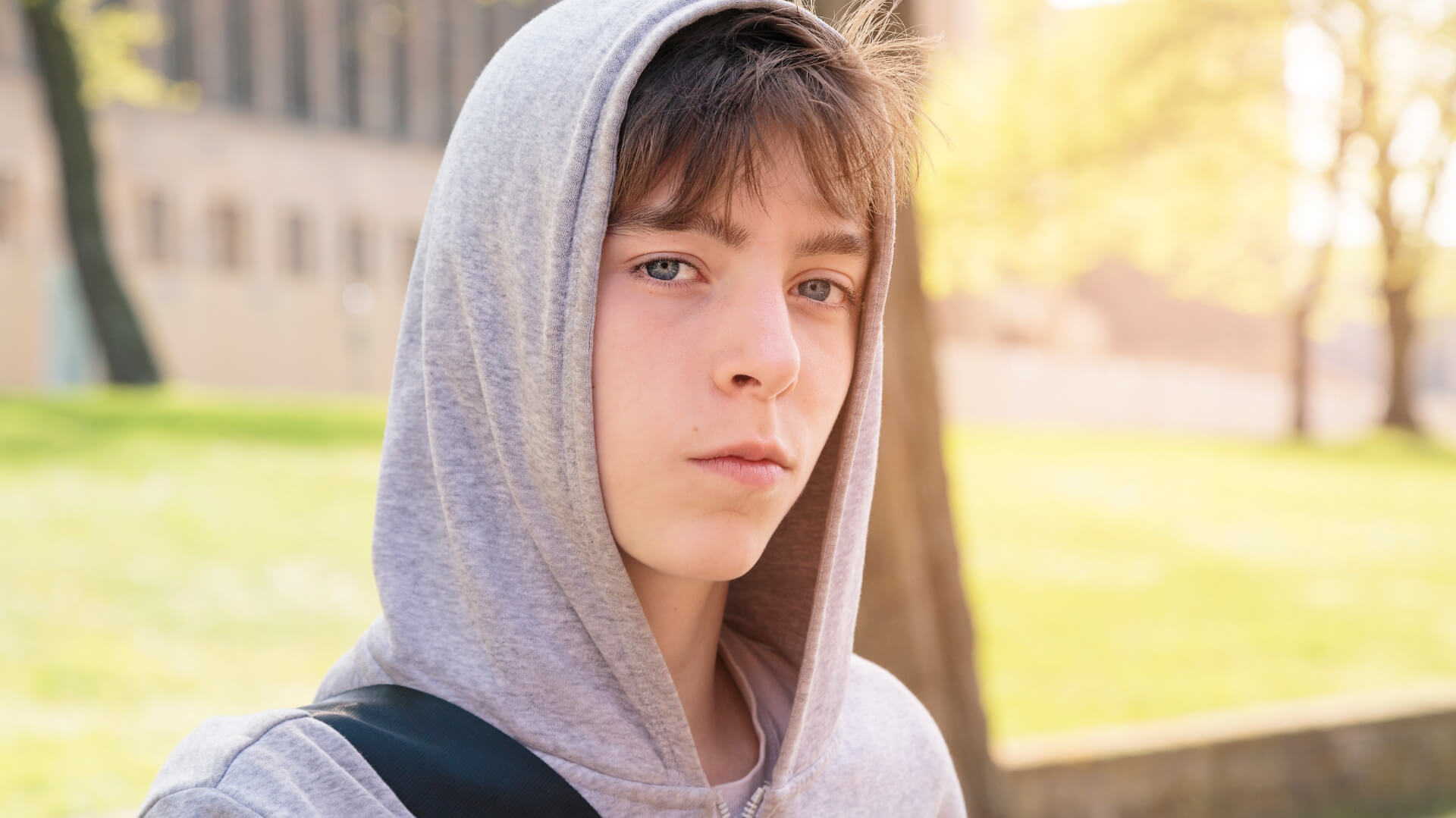 Teen boy in hoodie