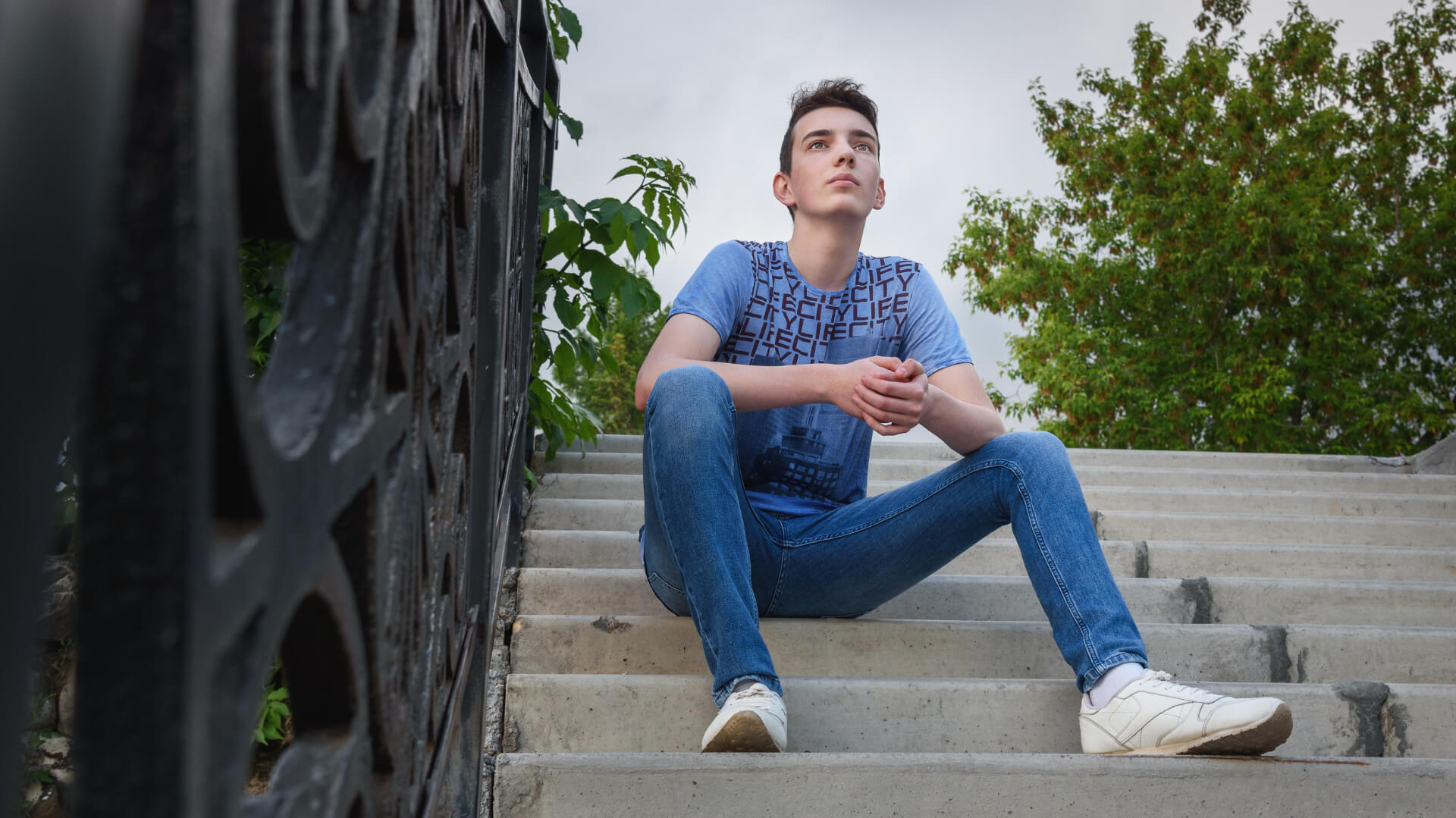 Teen boy on stairs