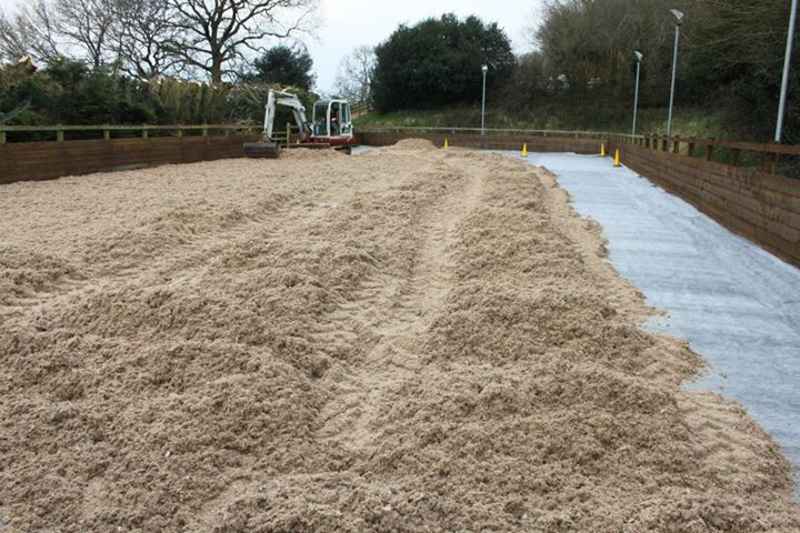 Waxed surface installation on a riding arena near Wiveliscombe