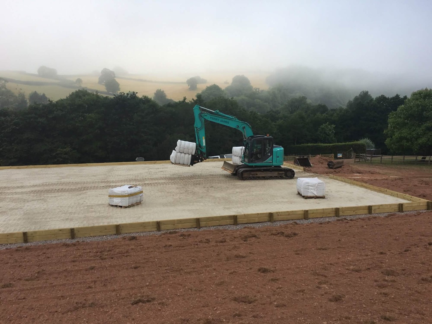 Blue digger moving sand