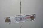 Crack monitoring gauge used by Sandarov Ltd to assess internal wall movement and establish whether structural remedial works are required.