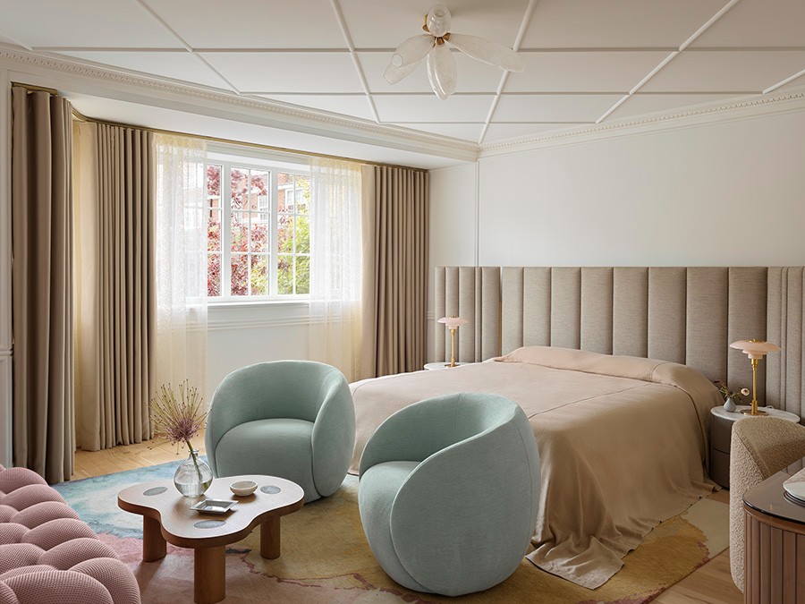 Bedroom with mint chairs