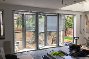 By fold door in stamford hill 