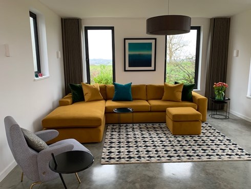 yellow couch in the living room